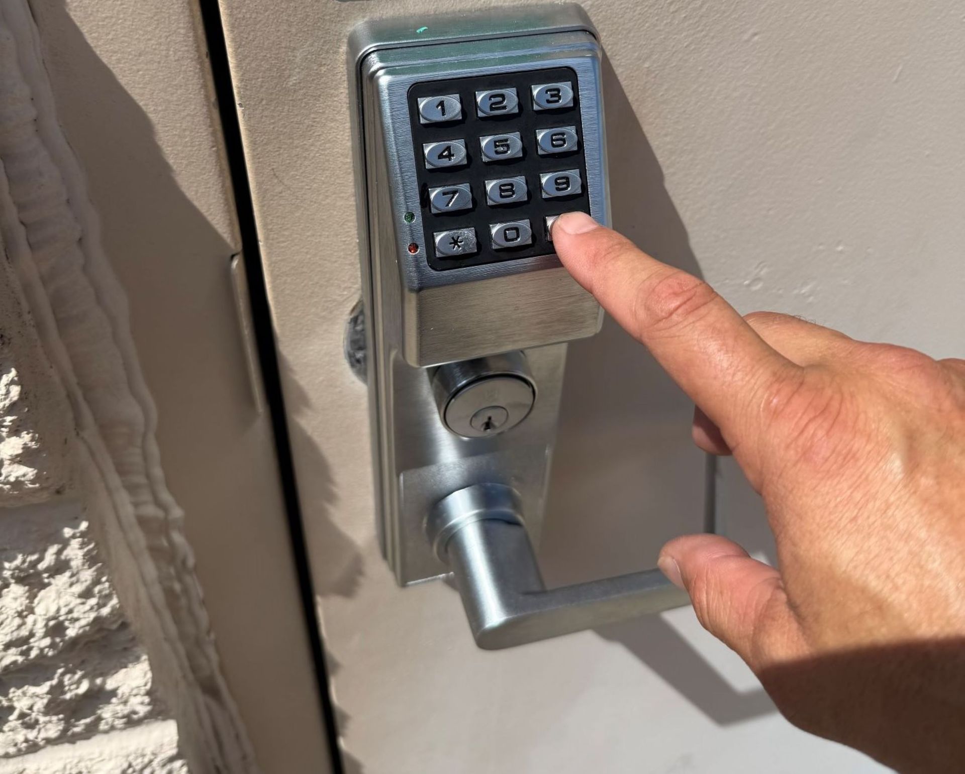 Commercial Keypad being programed by fortress lock & Saf