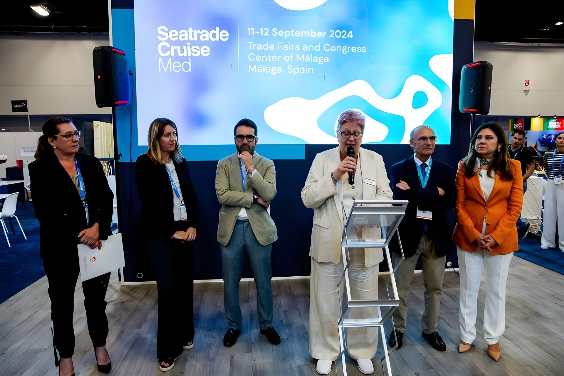 man and woman talking inside office