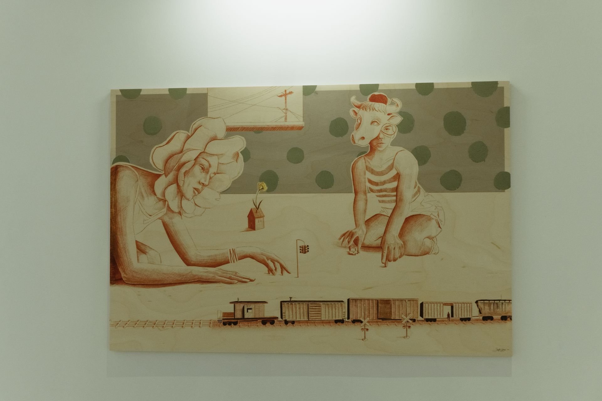 Surrealist mixed media on wood by Jane the Stranger — two figures at play with toy train, bull-masked child and flower-headed woman, polka dot wallpaper background, Private Collection