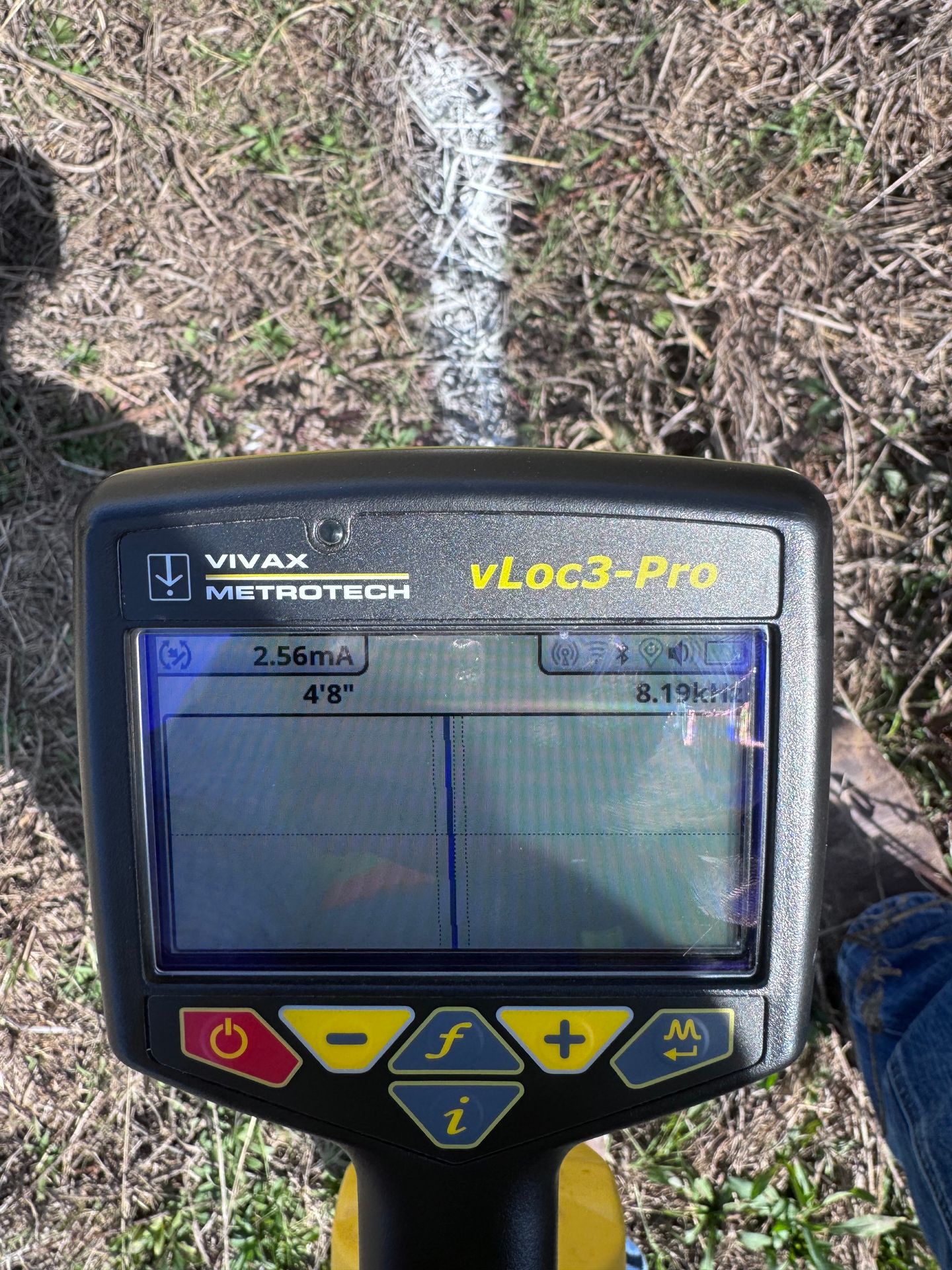 SiteTwin technician performing electromagnetic utility locating on a private commercial site in Texas