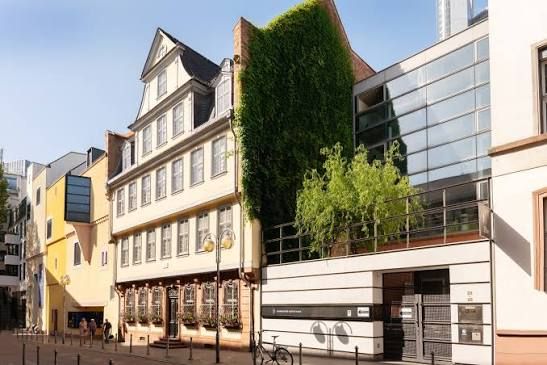 Exterior of the Goethe House in Frankfurt, Germany, the restored birthplace of renowned writer Johann Wolfgang von Goethe, showcasing its historic architecture alongside a modern museum addition.