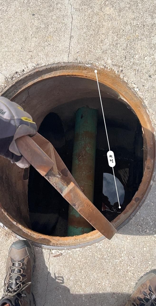 Technician using locating equipment during a private utility investigation