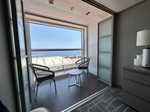 Veranda stateroom with private balcony and ocean views. Veranda stateroom with private balcony and ocean views.