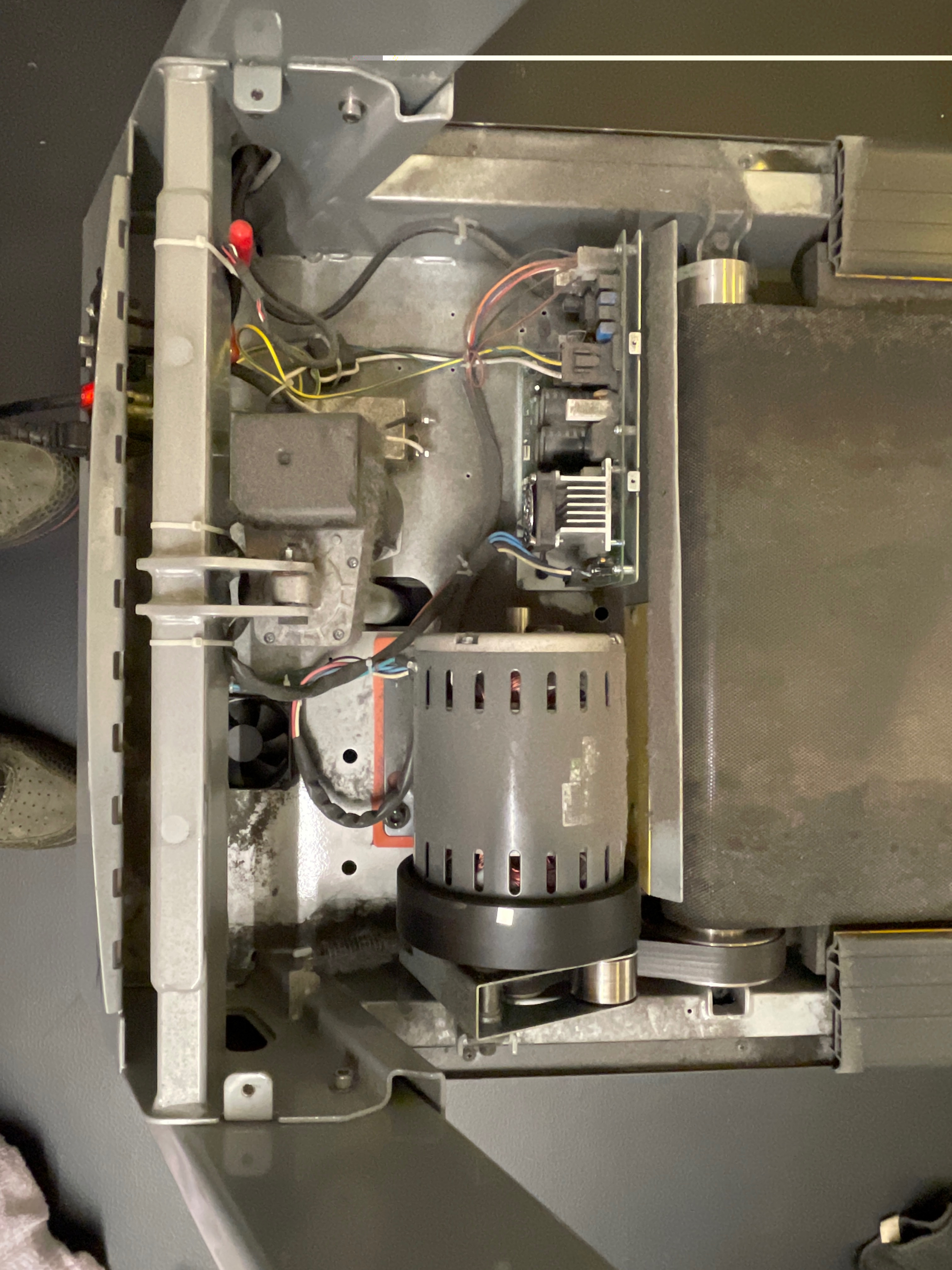 Picture of what it looks like under the hood of a treadmill thats not being serviced. 