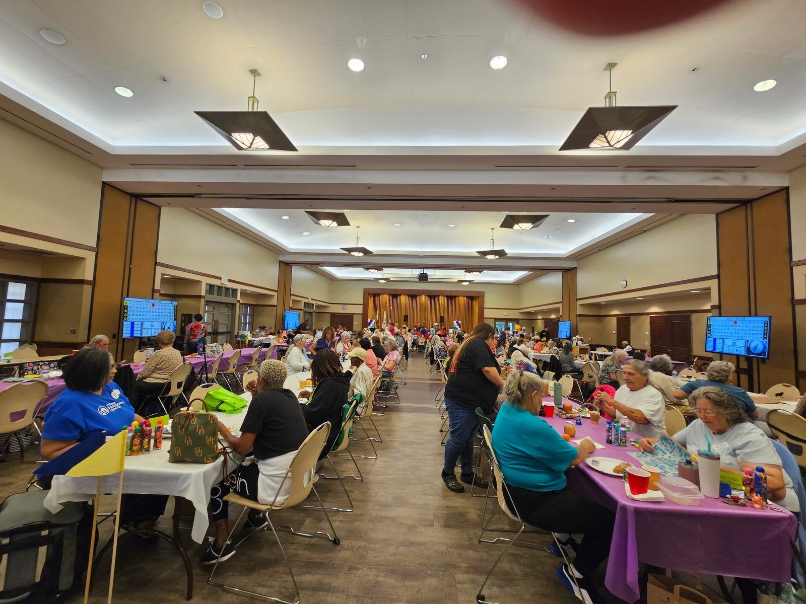 A full hall of VIP Seniors members at decorated tables during the Senior Month celebration A full hall of VIP Seniors members at decorated tables during the Senior Month celebration