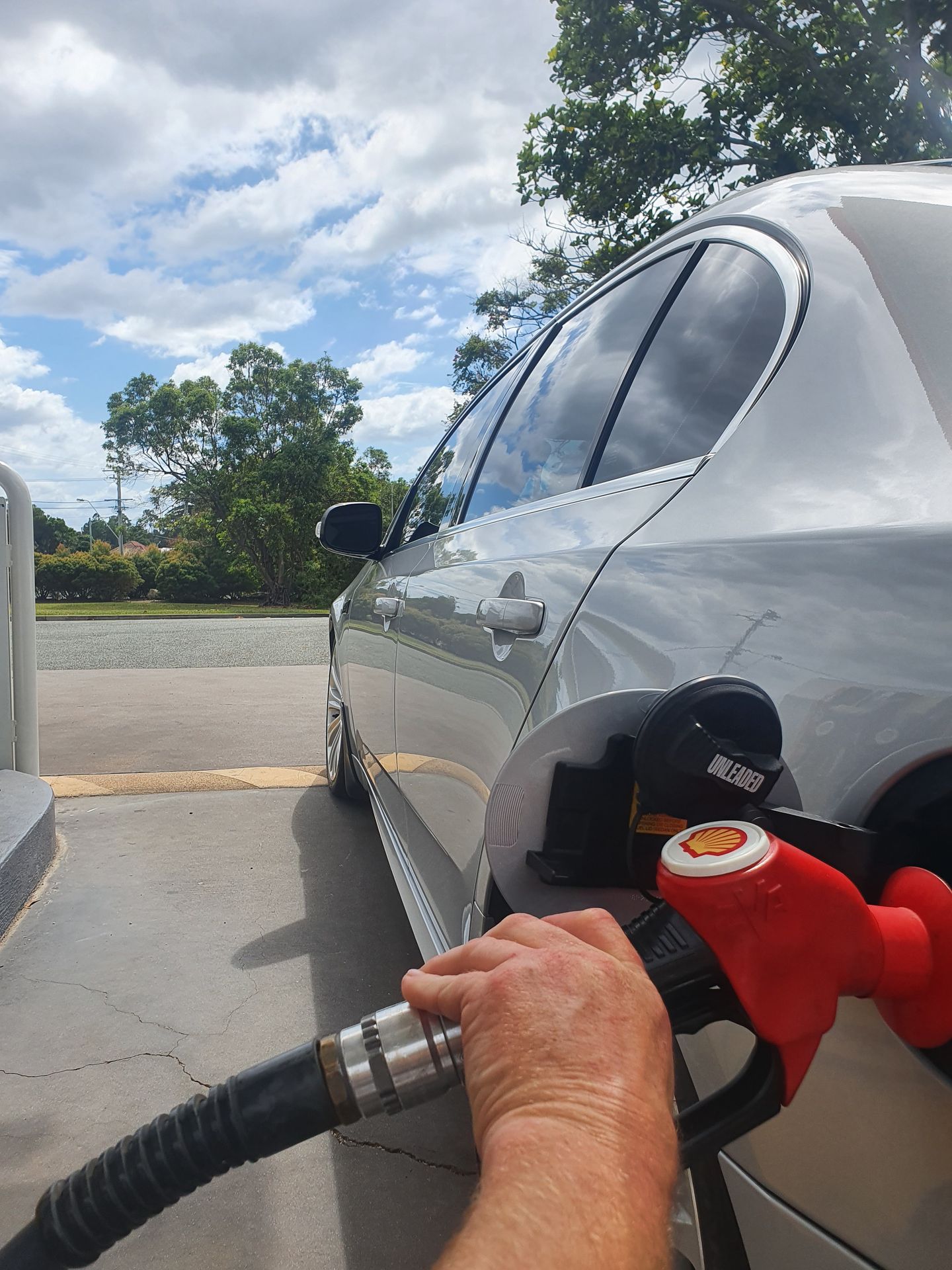 Silver High Performance Ford G6E Filling Up With Premium 98 Silver High Performance Ford G6E Filling Up With Premium 98