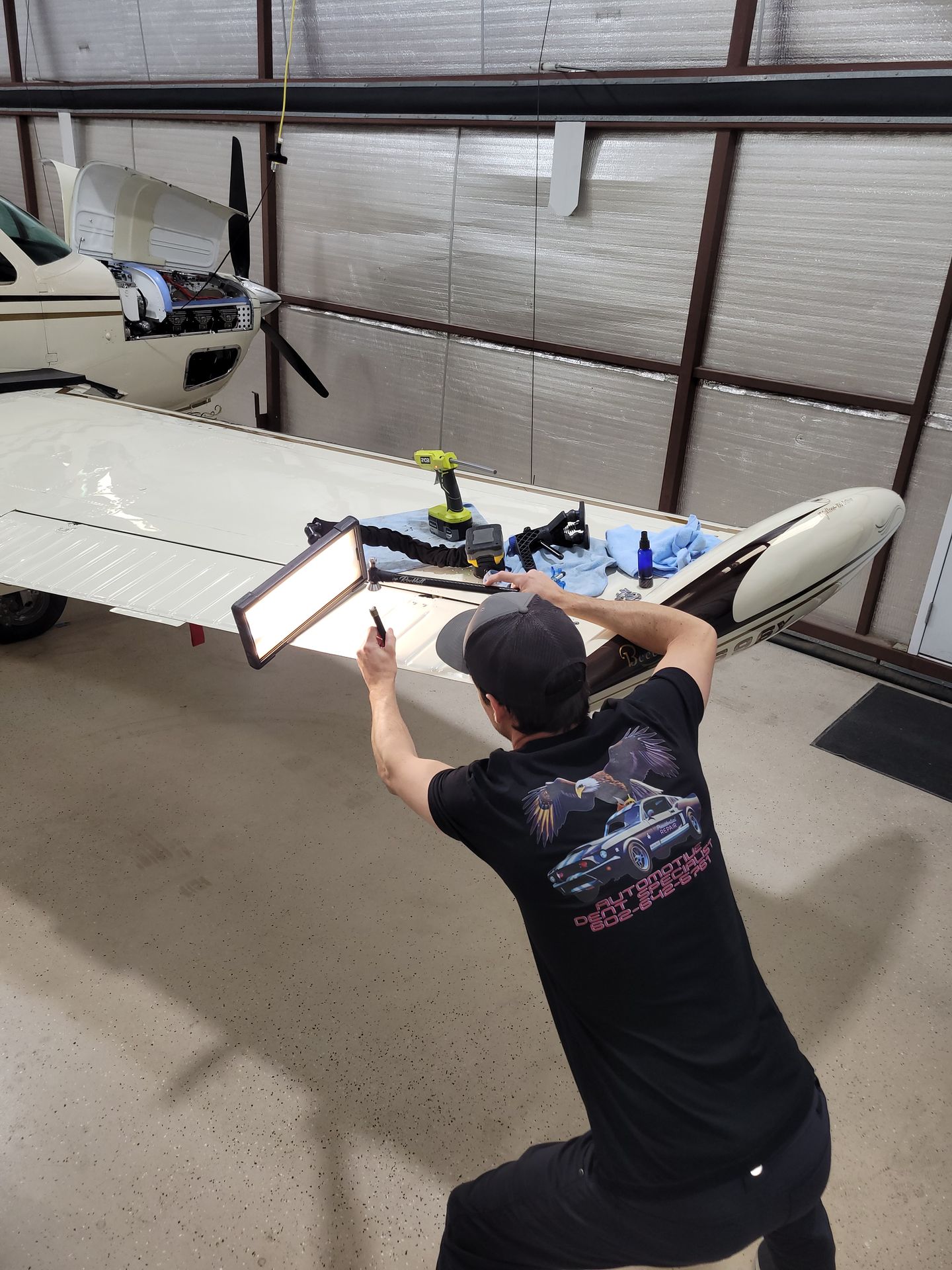 PresiDENTial Repair technician performing specialty metal repair