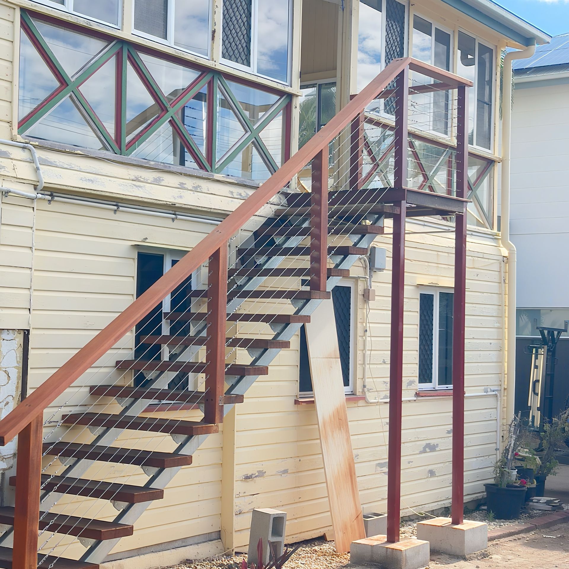 Newly built external wooden stairs with clean lines and durable materials for safe everyday use. Indoor wooden staircase with polished finish and elegant design