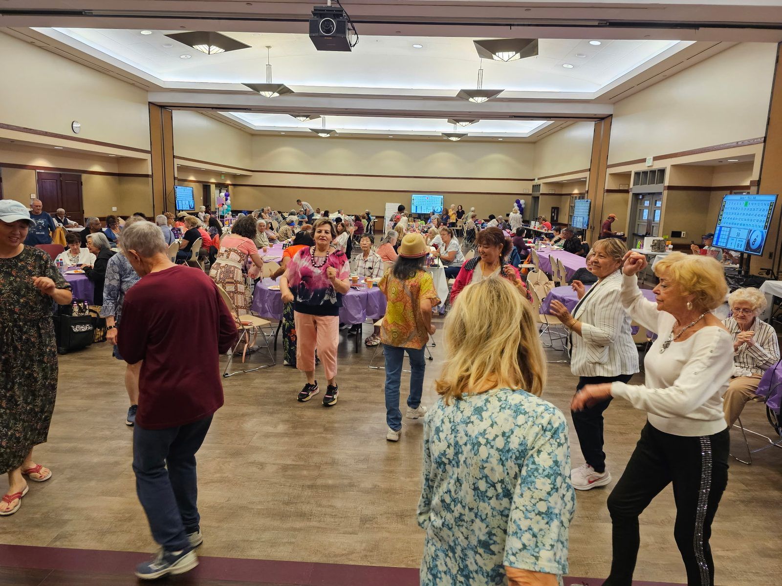 VIP Seniors members dancing during the Senior Month celebration VIP Seniors members dancing during the Senior Month celebration