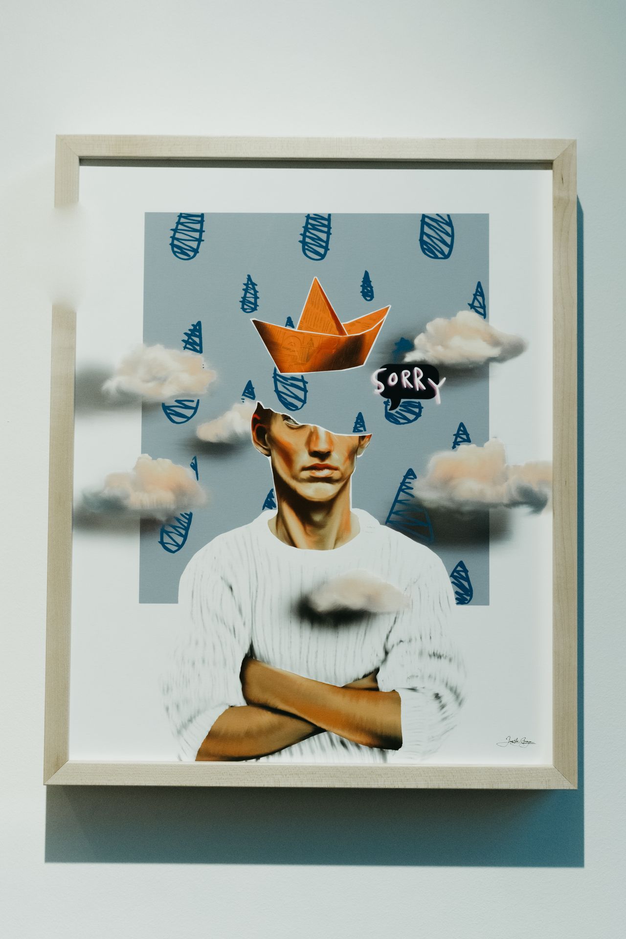 Surrealist mixed media on paper by Jane the Stranger — male figure with paper boat crown and Sorry speech bubble, clouds and hand-drawn raindrops, framed