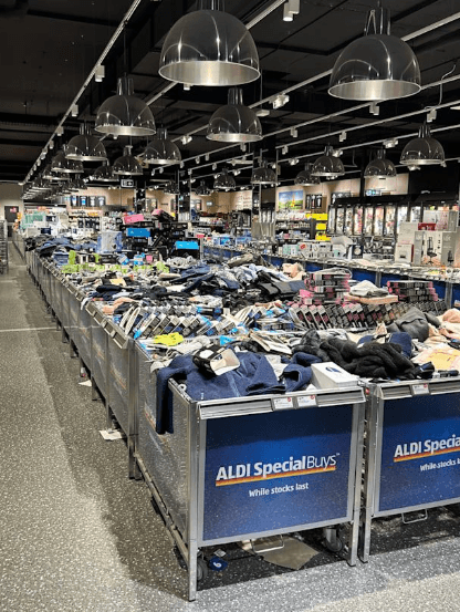 This photo, sourced from Yahoo News, depicts Aldi's overstocked shelves of unsold snow gear—a clear example of a seasonal 