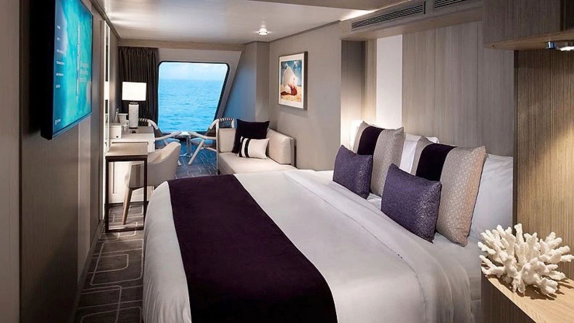 Ocean-view cruise cabin overlooking a Celebrity ship. Ocean-view cruise cabin overlooking a Celebrity ship.