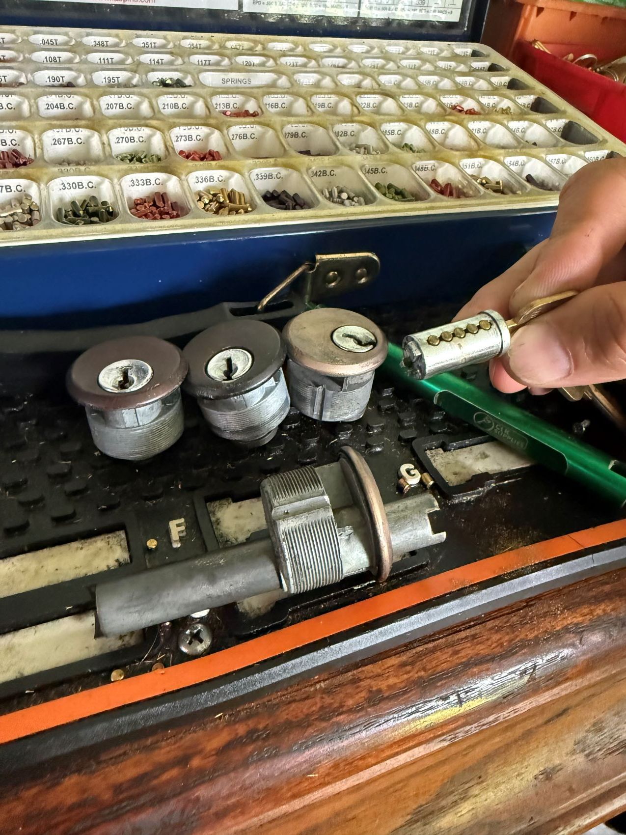 Commercial locks on a bench being rekeyed