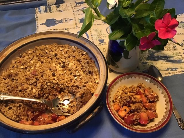 Pie shaped dish of apples and plums combine with prickly pear syrup and a mesquite oatmeal topping served in a china bowl for the perfect Southwest dessert. Pie shaped dish of apples and plums combine with prickly pear syrup and a mesquite oatmeal topping served in a china bowl for the perfect Southwest dessert.