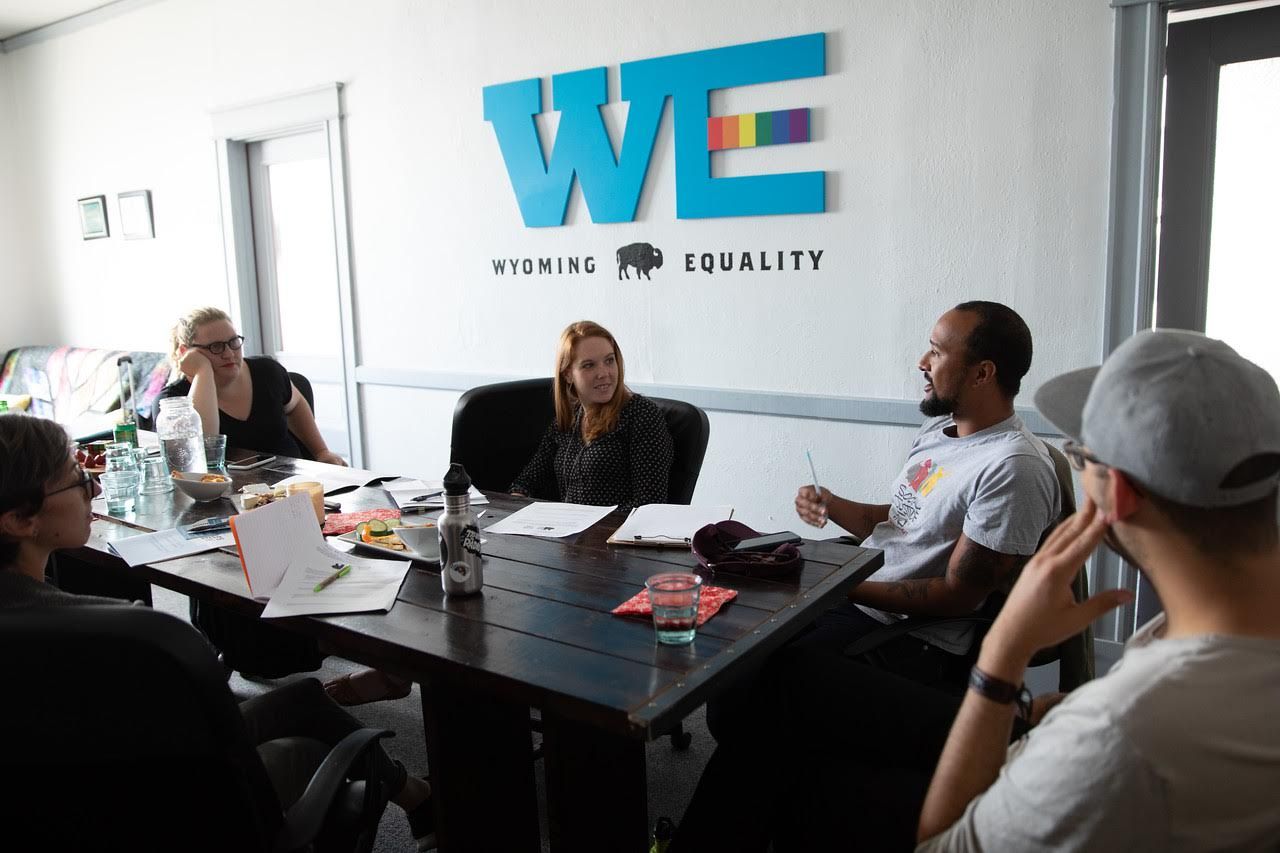 People setting in a meeting together