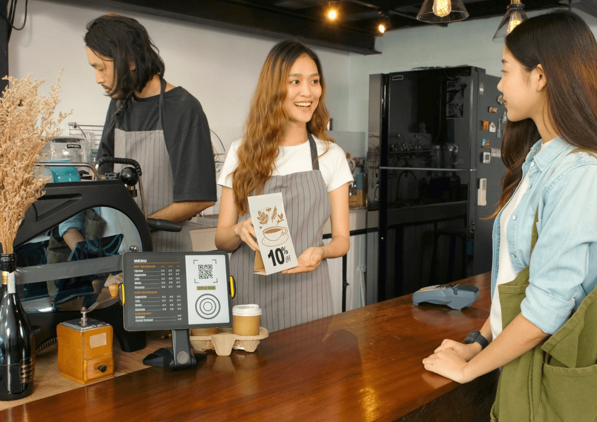 Bring your own cup get discount, Young asian woman barista, waitress introducing zero waste promotion to asia girl customer in coffee shop cafe Bring your own cup get discount, Young asian woman barista, waitress introducing zero waste promotion to asia girl customer in coffee shop cafe