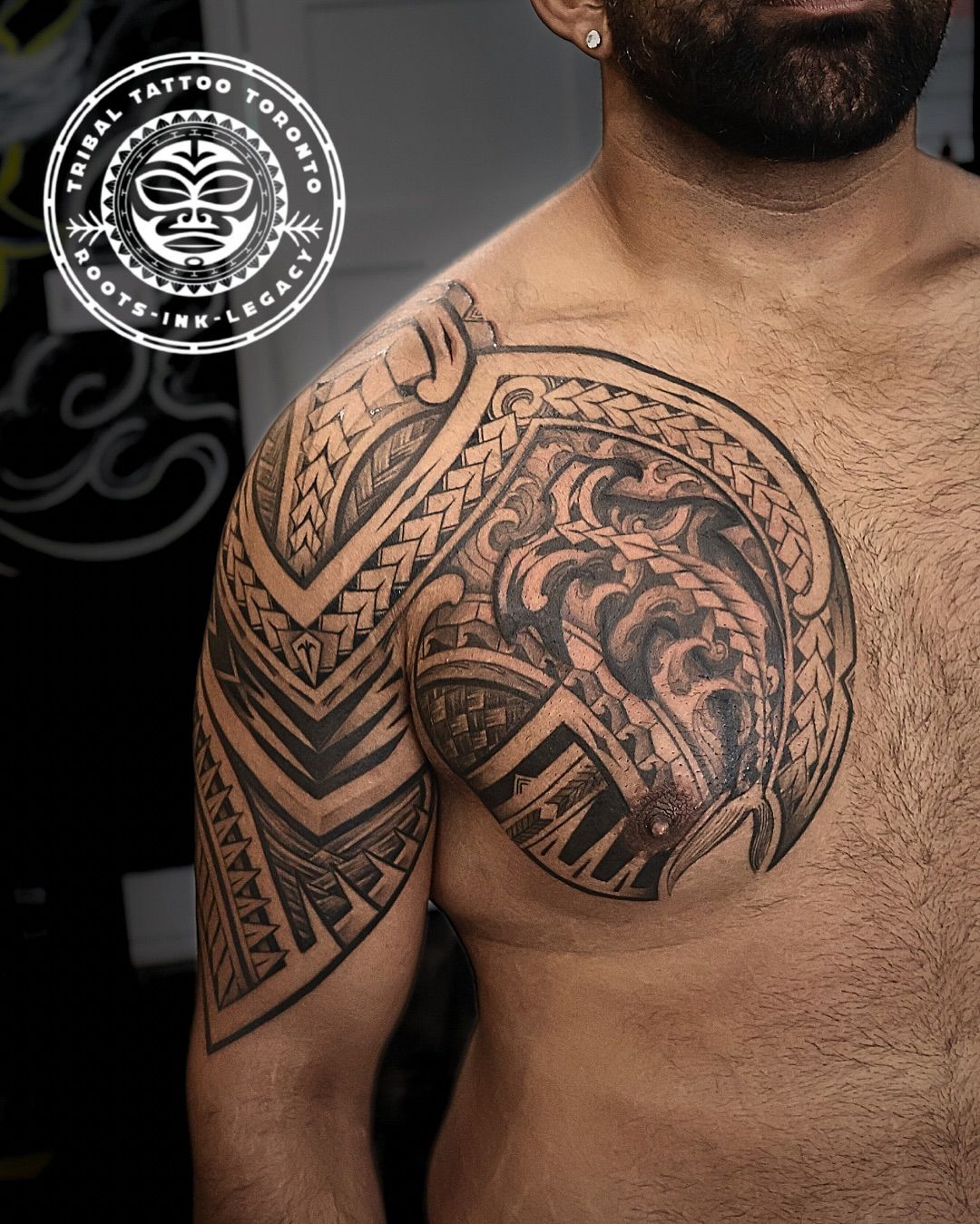 Custom blackwork tribal tattoo across the chest and shoulder, freehand designed by Michael Tran at Tribal Tattoo Toronto Custom blackwork tribal tattoo across the chest and shoulder, freehand designed by Michael Tran at Tribal Tattoo Toronto