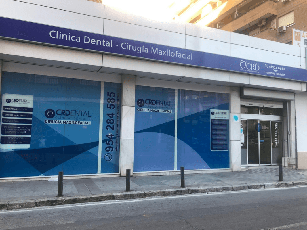 Dental clinic consultation with a smiling woman showcasing healthy teeth Dental clinic consultation with a smiling woman showcasing healthy teeth