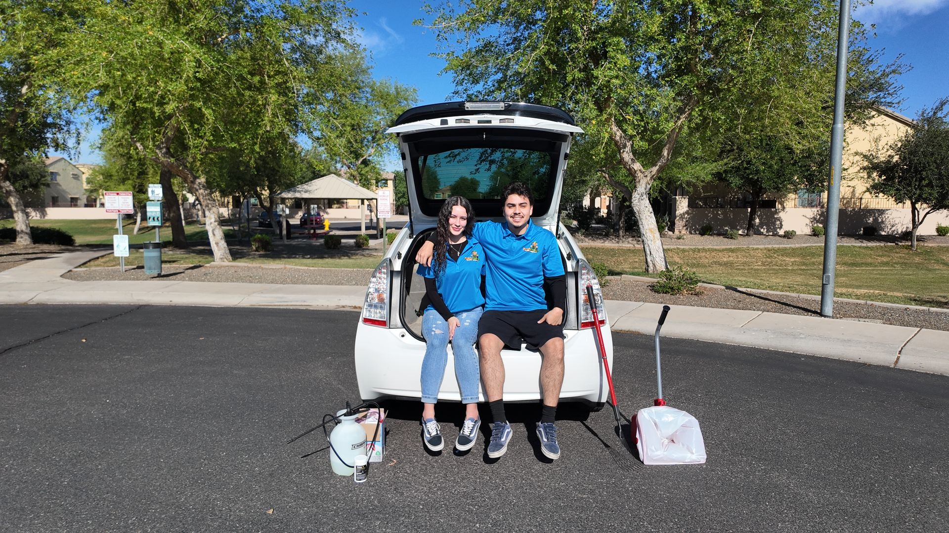Couple that scoops poop sitting in car