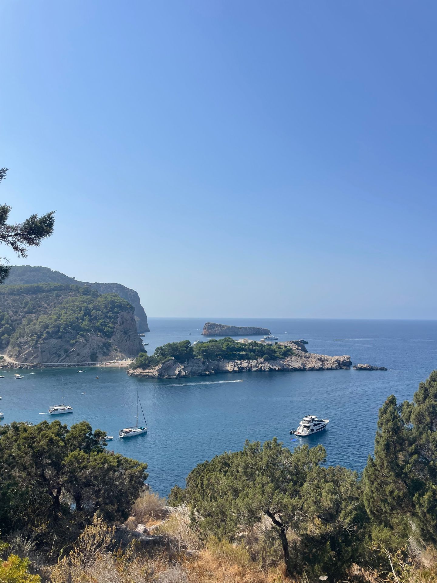 Peaceful Mediterranean cove in Ibiza ideal for an autumn swim