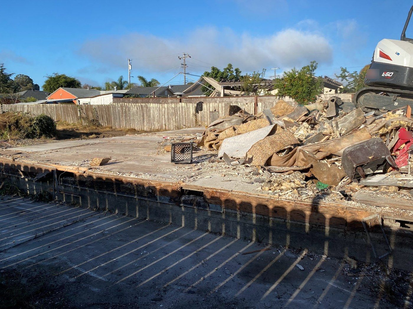 Richmond project, photo 19: Debris removal around remaining slab