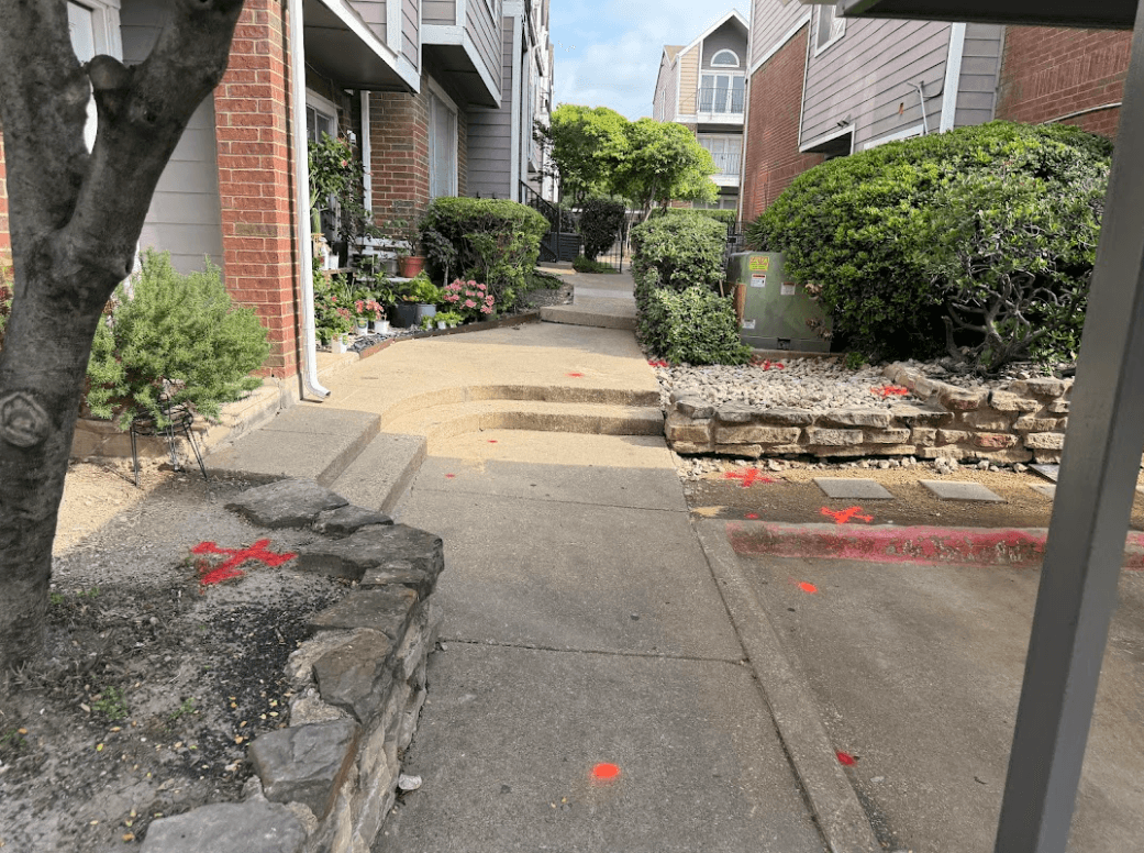 Fiber utility locating in Fort Worth, TX with marked underground lines before directional boring