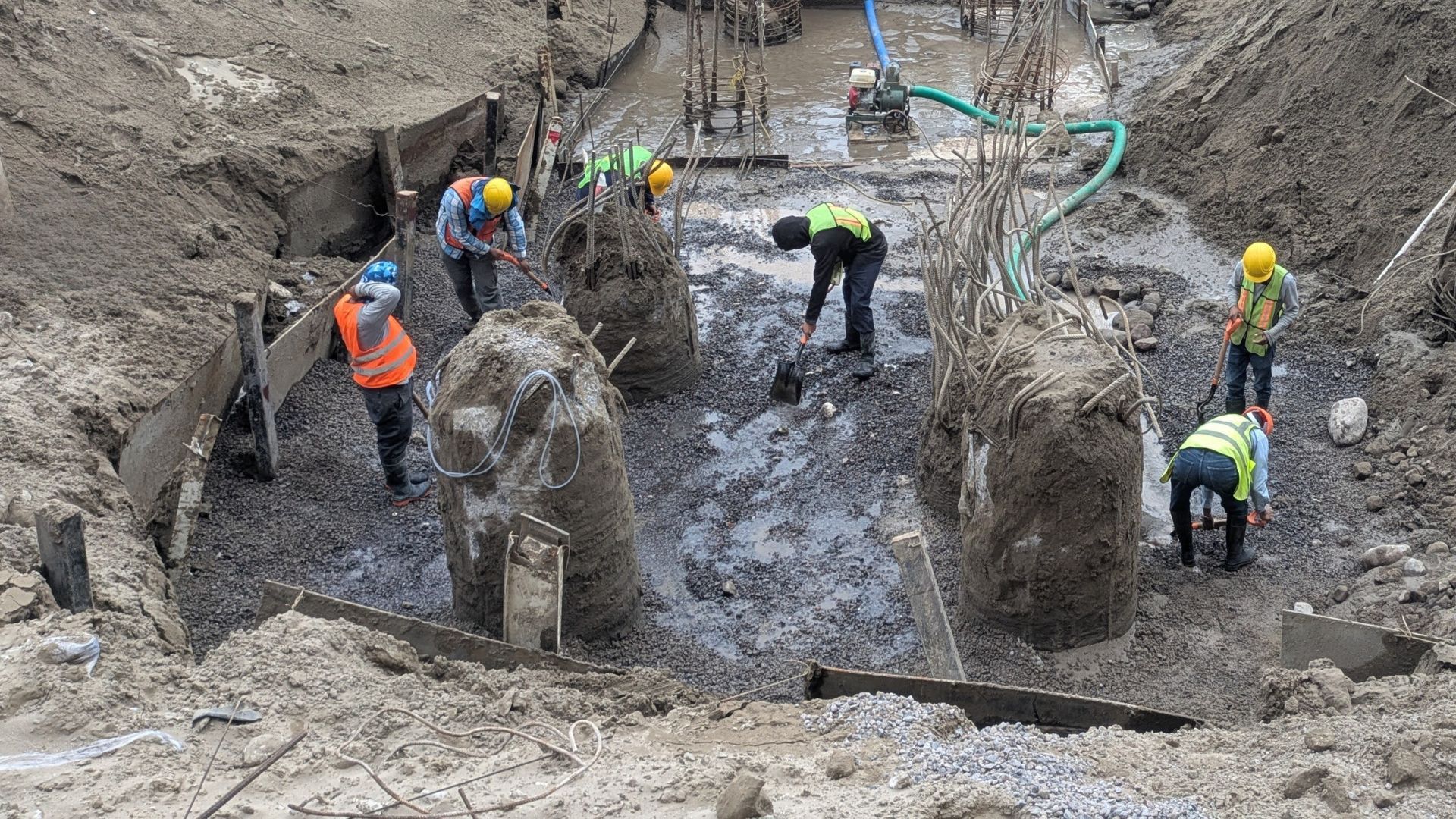 excavators and truck working in construction site