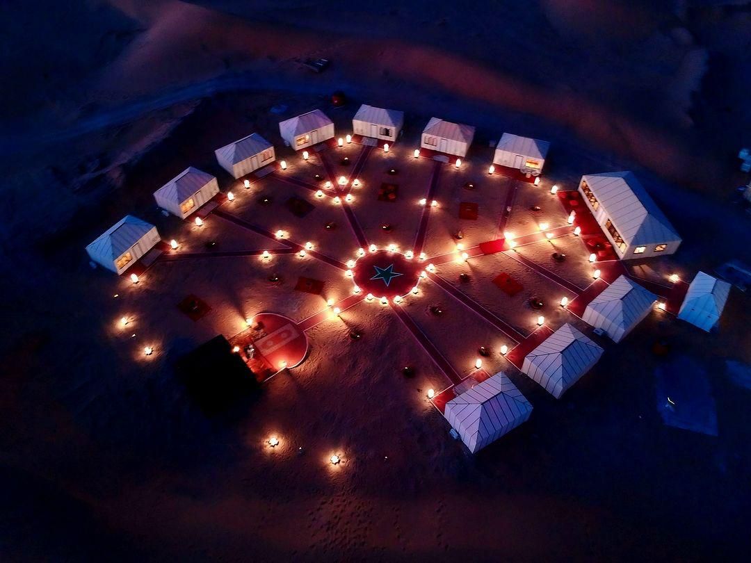 A Luxury camp in marzouga desert from above 