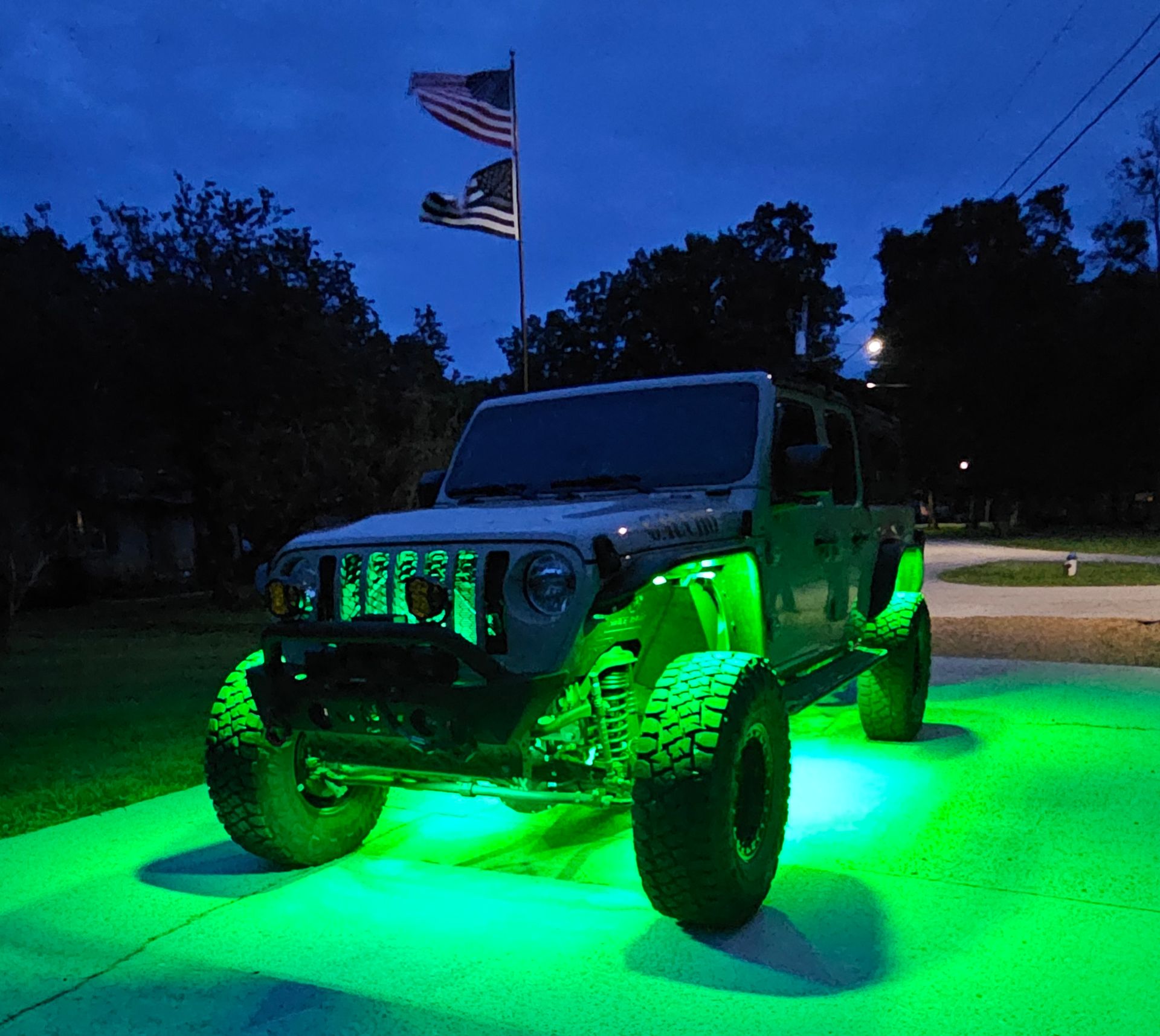 Infinite Offroad rock lights installed on Jeep Gladiator by Red White and Glow