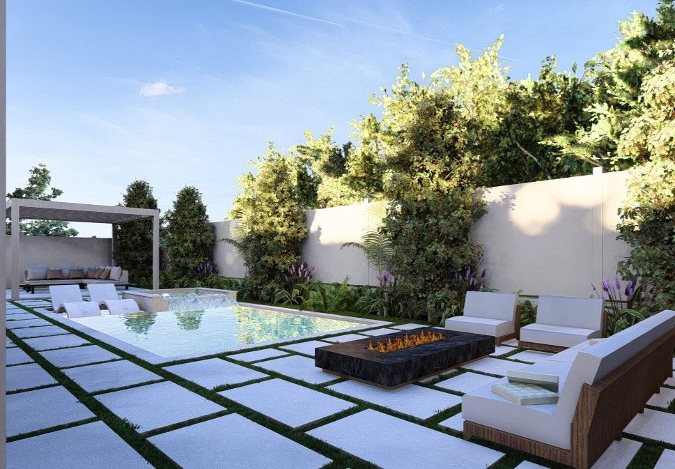 Backyard lounge with a sunken fire feature, seating, pavers, and turf joints
