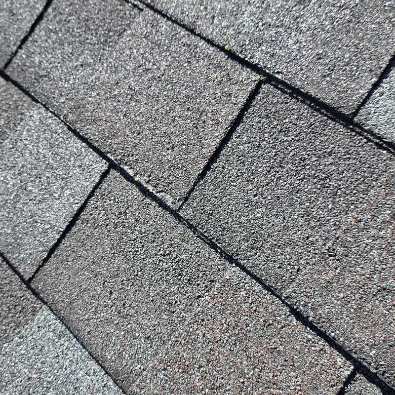 Lifted shingle edges