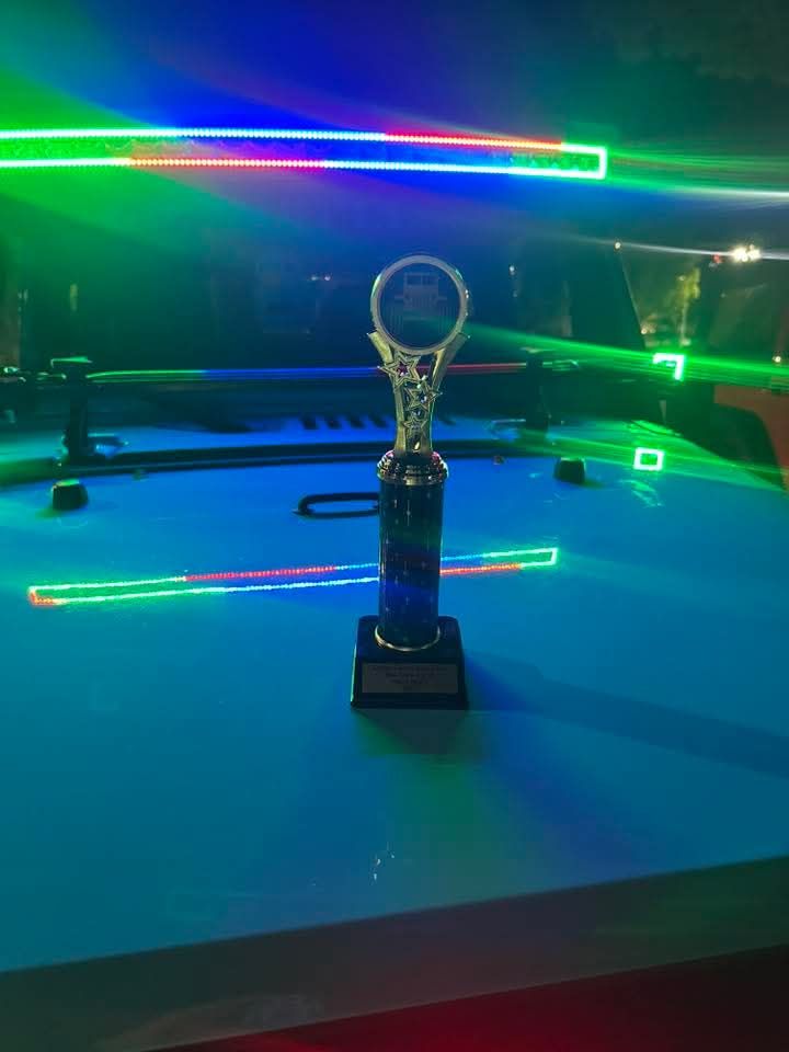 Award-winning Jeep Wrangler lighting build with trophy at Neon Nights off-road event