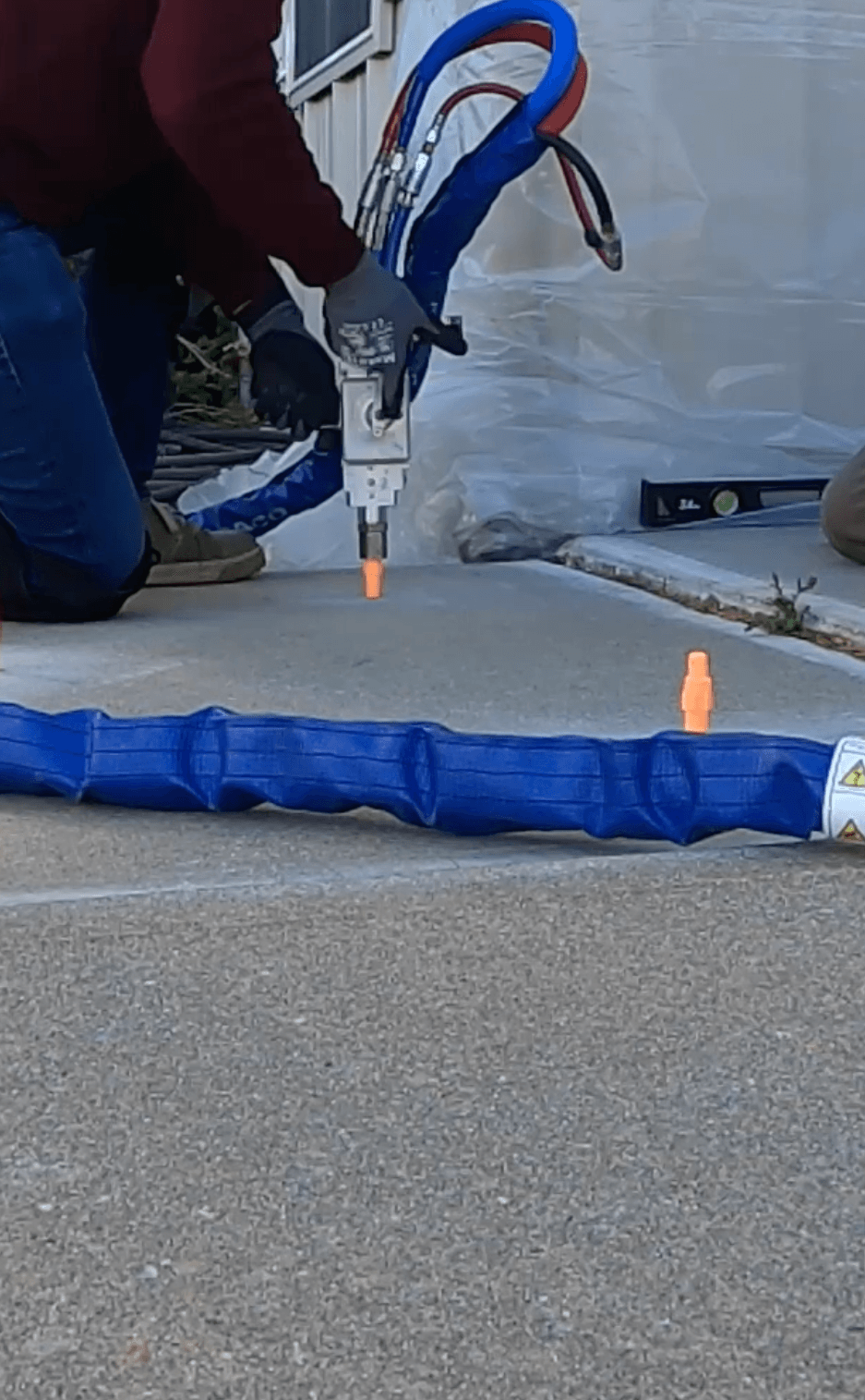 Polyjacking foam under concrete slab