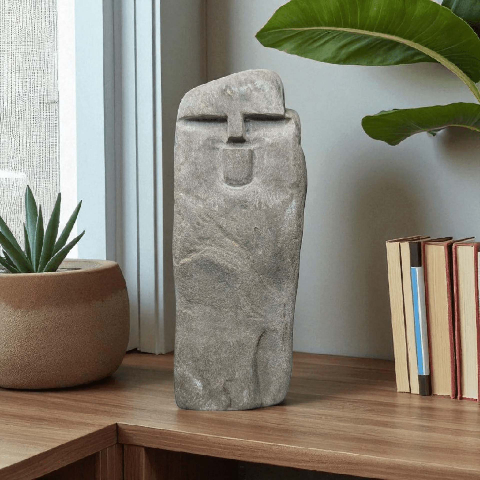 Stone rock with face carved