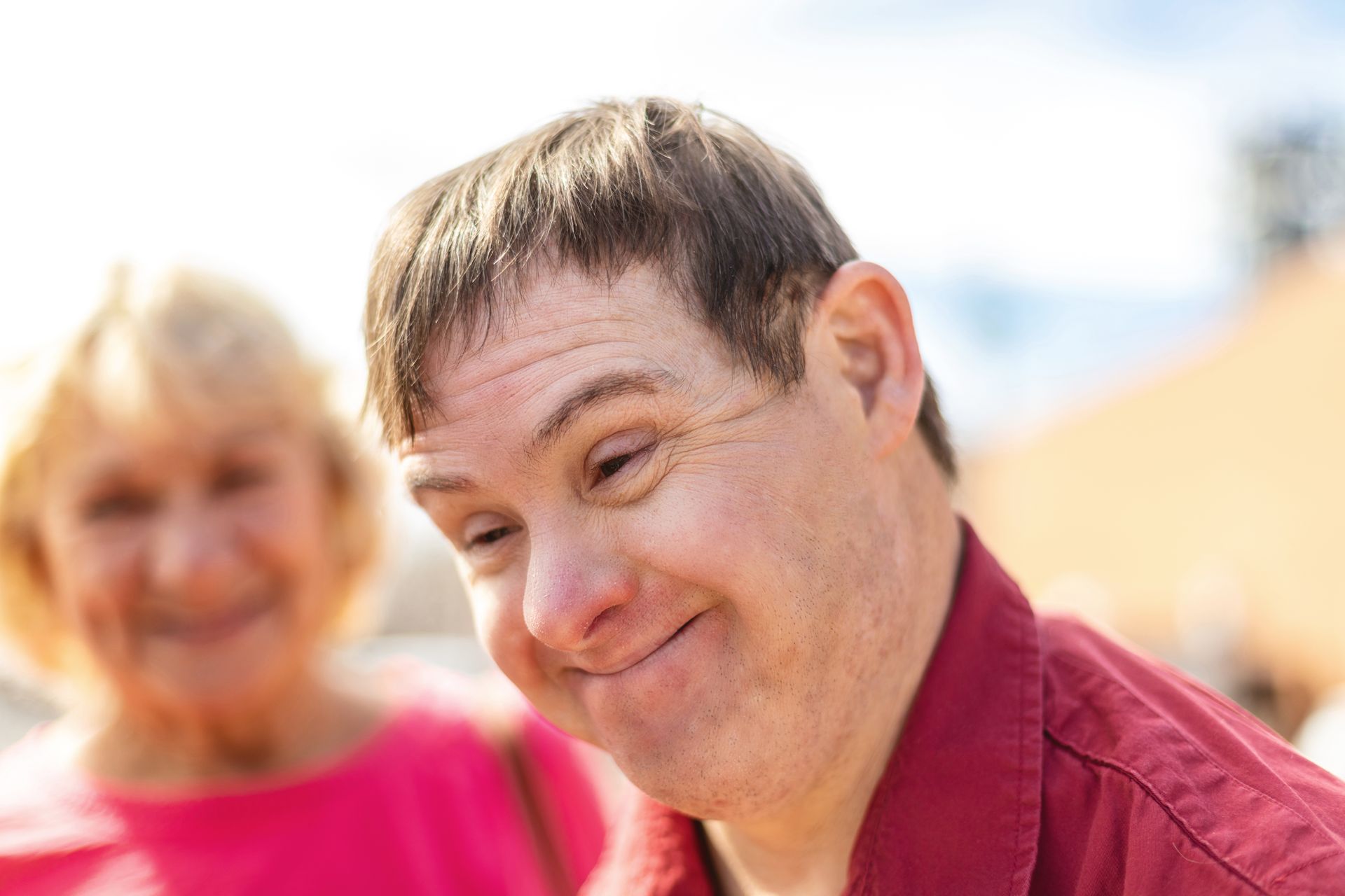 A woman kissing a man on the cheek A woman kissing a man on the cheek