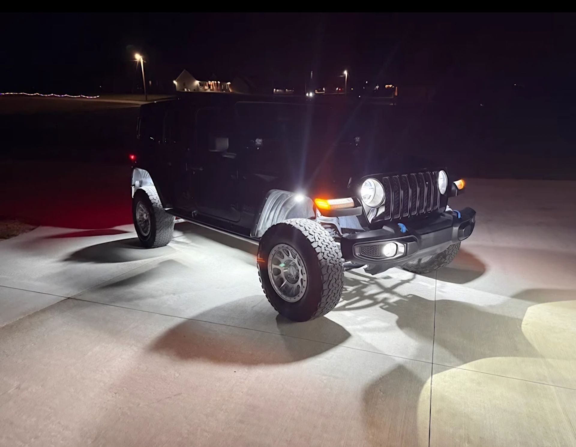 Jeep with white rock lights installed in Manchester Tennessee by Red White and Glow