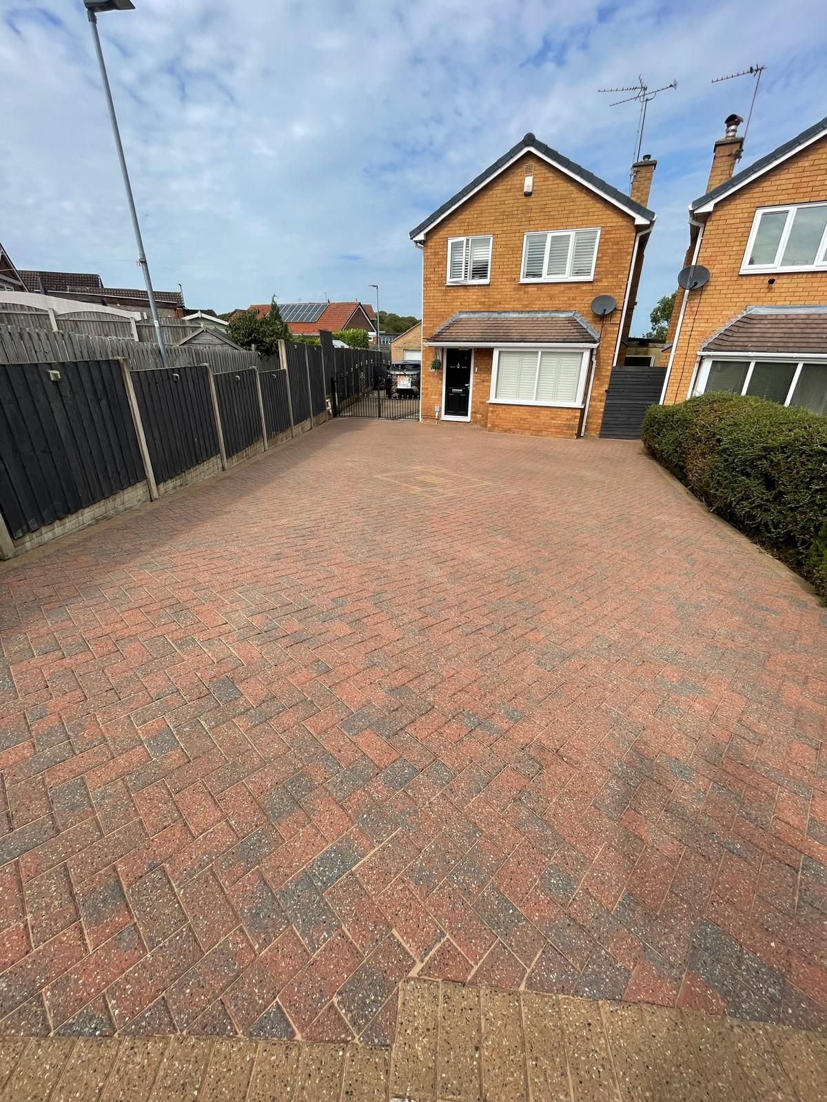 Block paved driveway after cleaning and resanding