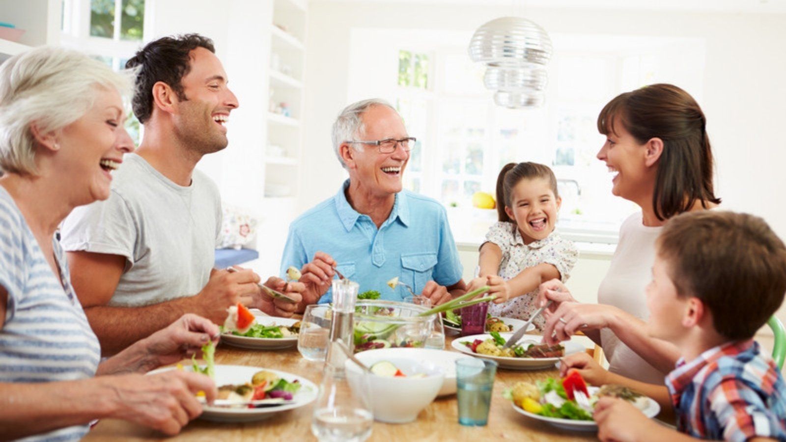 Three generations of a family at the table agreeing a family safe word to beat AI voice clone scams Three generations of a family at the table agreeing a family safe word to beat AI voice clone scams