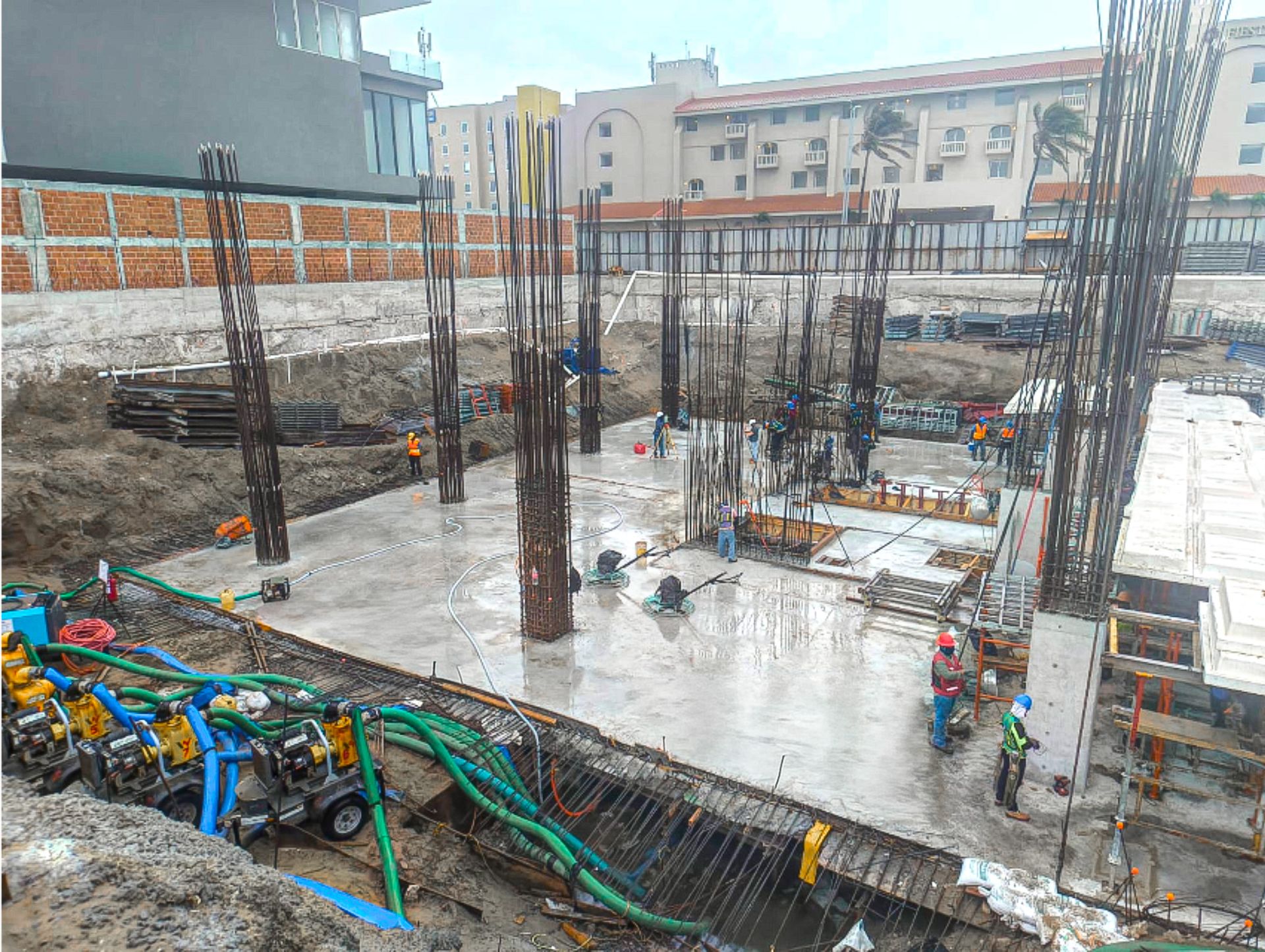 excavators and truck working in construction site