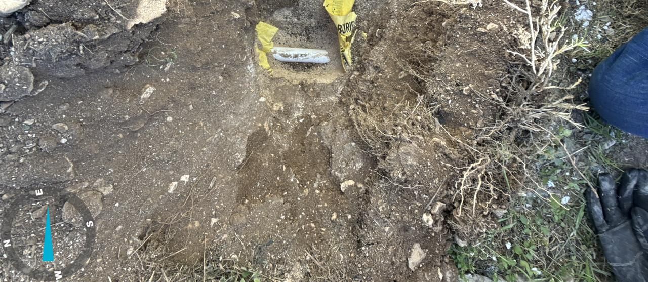Private Property | A private utility exposed during excavation on private property