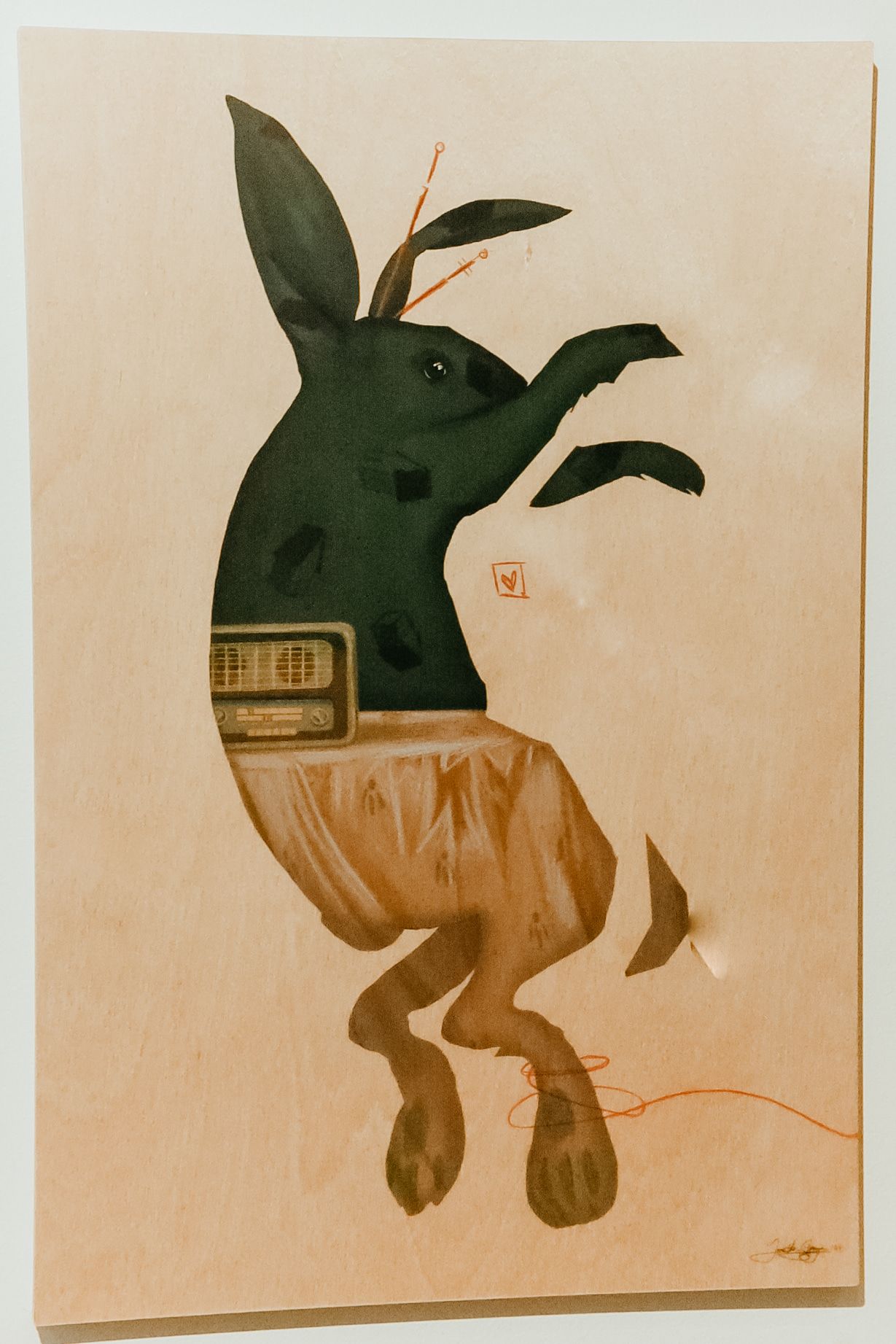 Surrealist mixed media on wood by Jane the Stranger — oversized hand reaching toward clustered houses, small figure standing apart, orange wash and drawn clouds, Private Collection