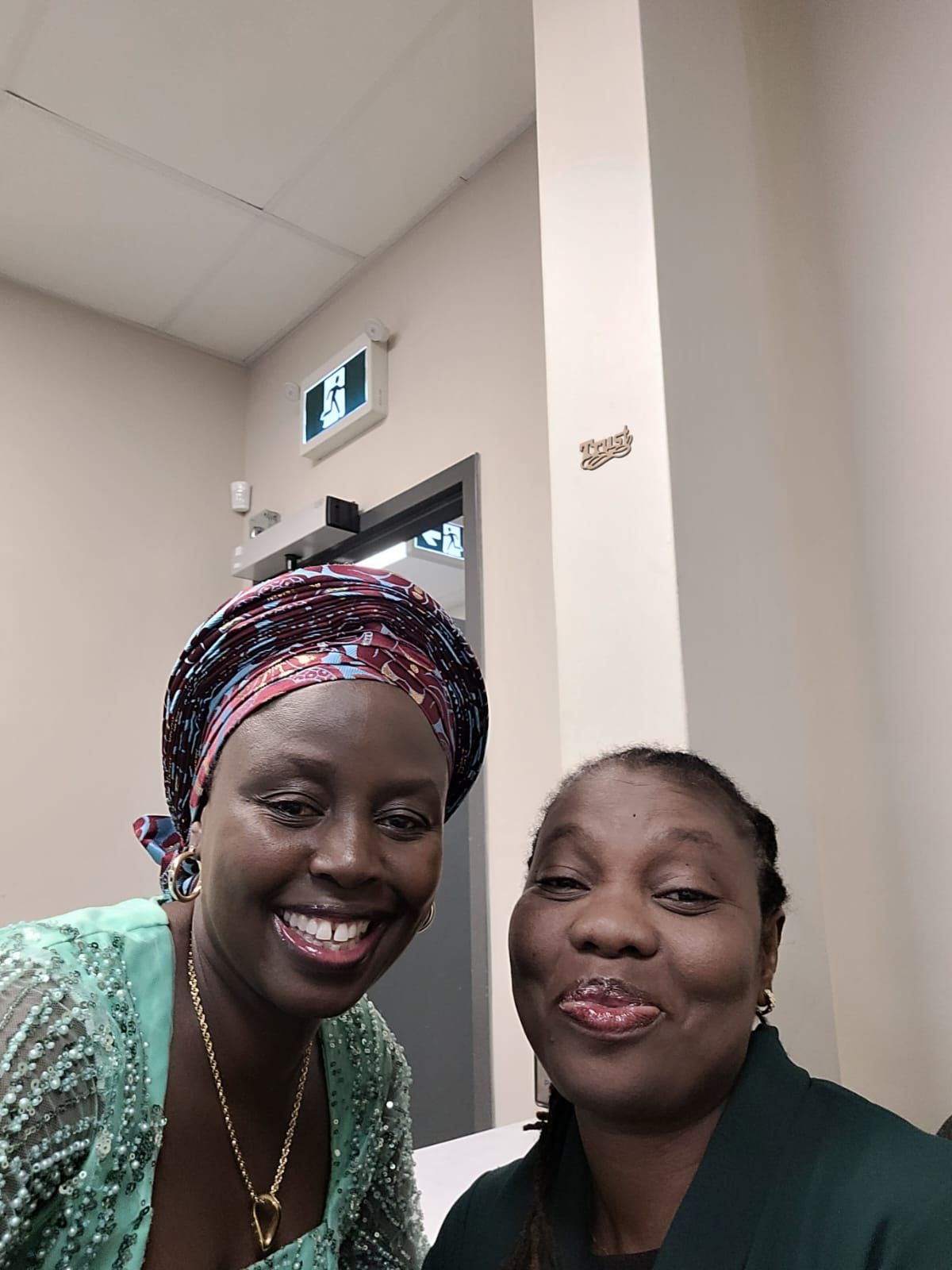 Shot of a group of young businesspeople clapping during a conference in a modern office