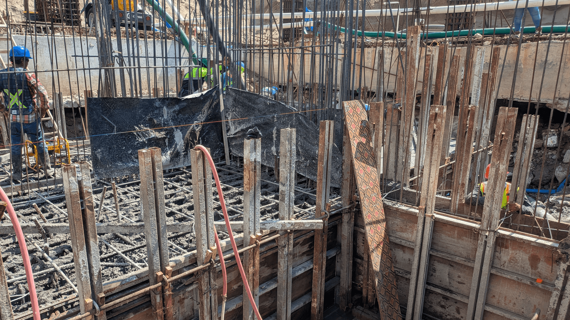 excavators and truck working in construction site excavators and truck working in construction site