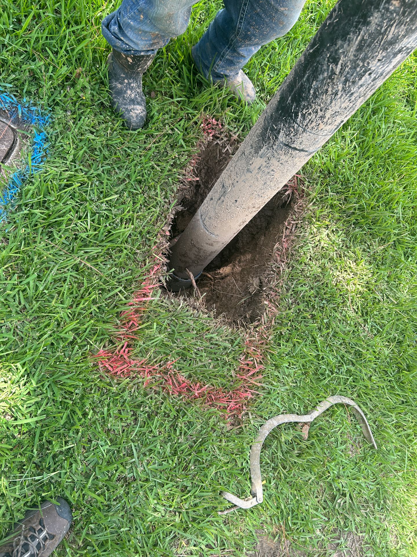 Potholing exposes a buried utility line to verify depth and location before excavation