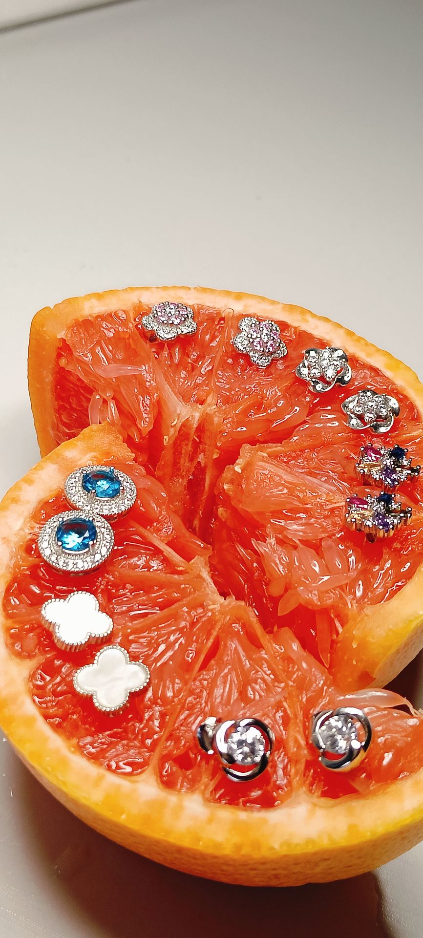grape fruit with diamond earrings jewellery showcased with taste exclusively by Deep Shine Jewellers
