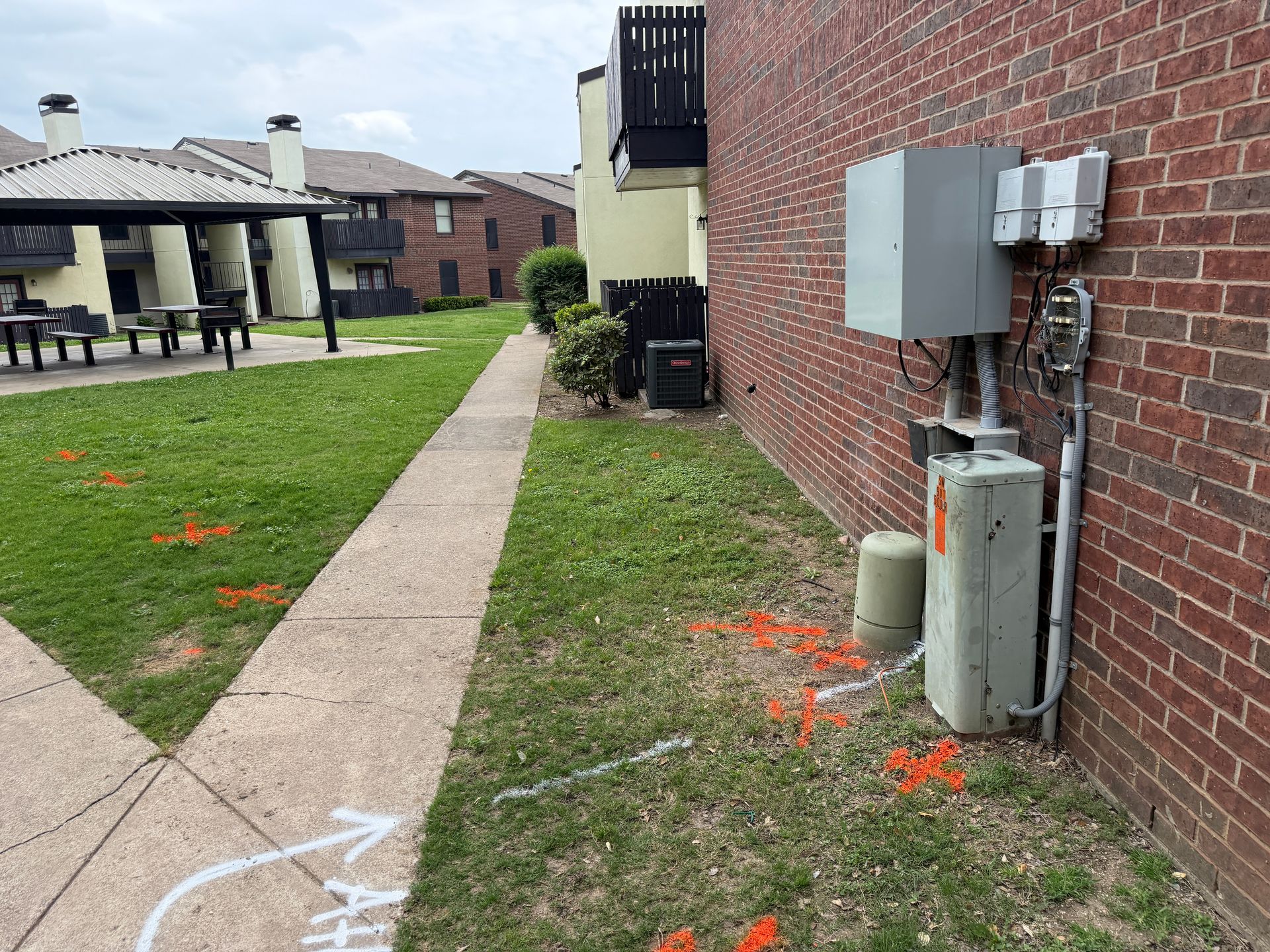 Private utility locate layout at Rolling Hills Place apartments in Lancaster, TX before excavation