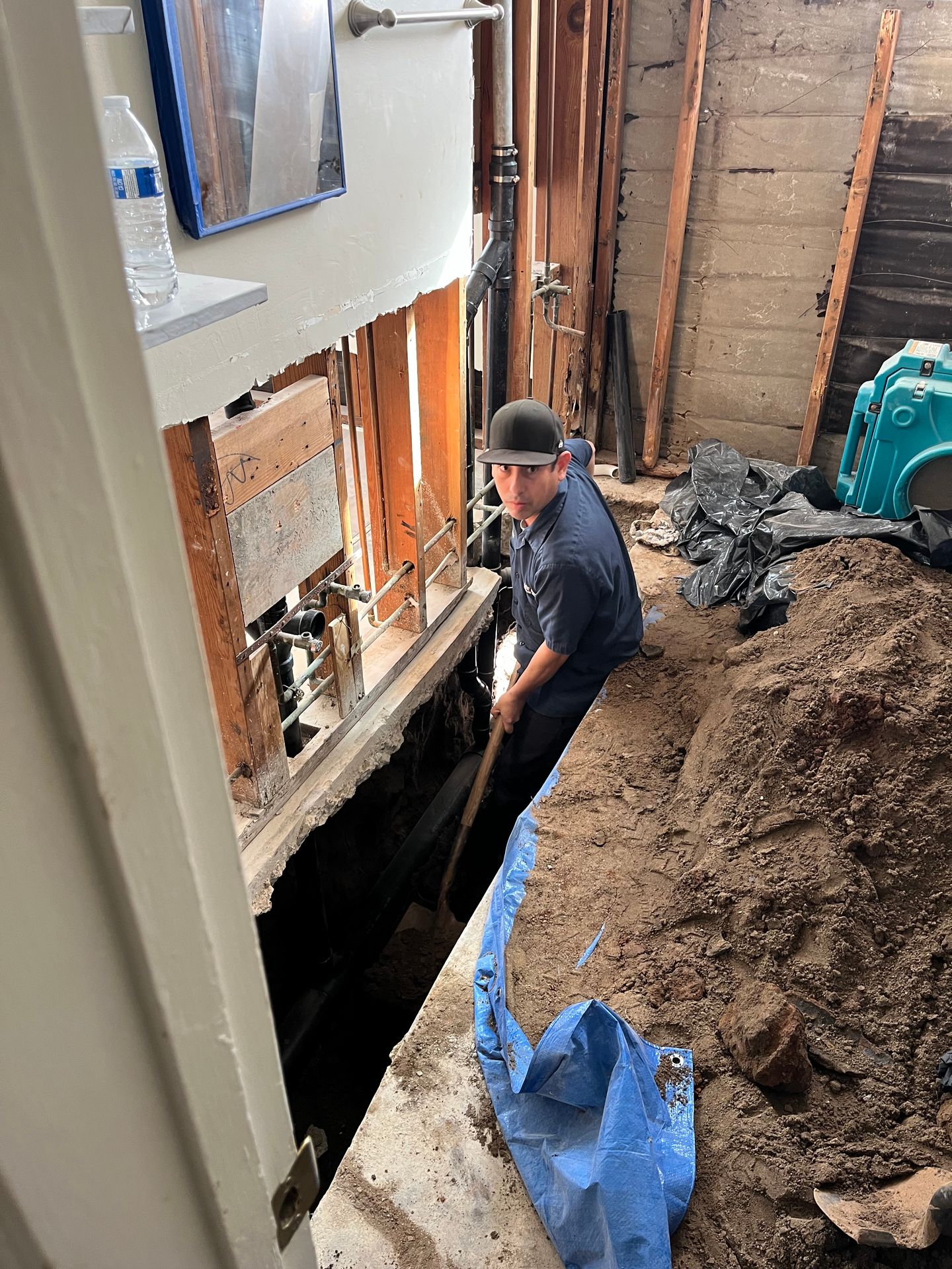 Sewer Main Line Repair and Replacement Having to Jack Hammer Cement to Access Cast Iron Pipes