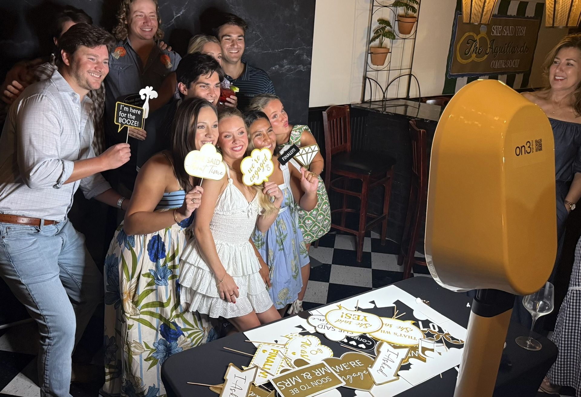happy group photo at engagement party
