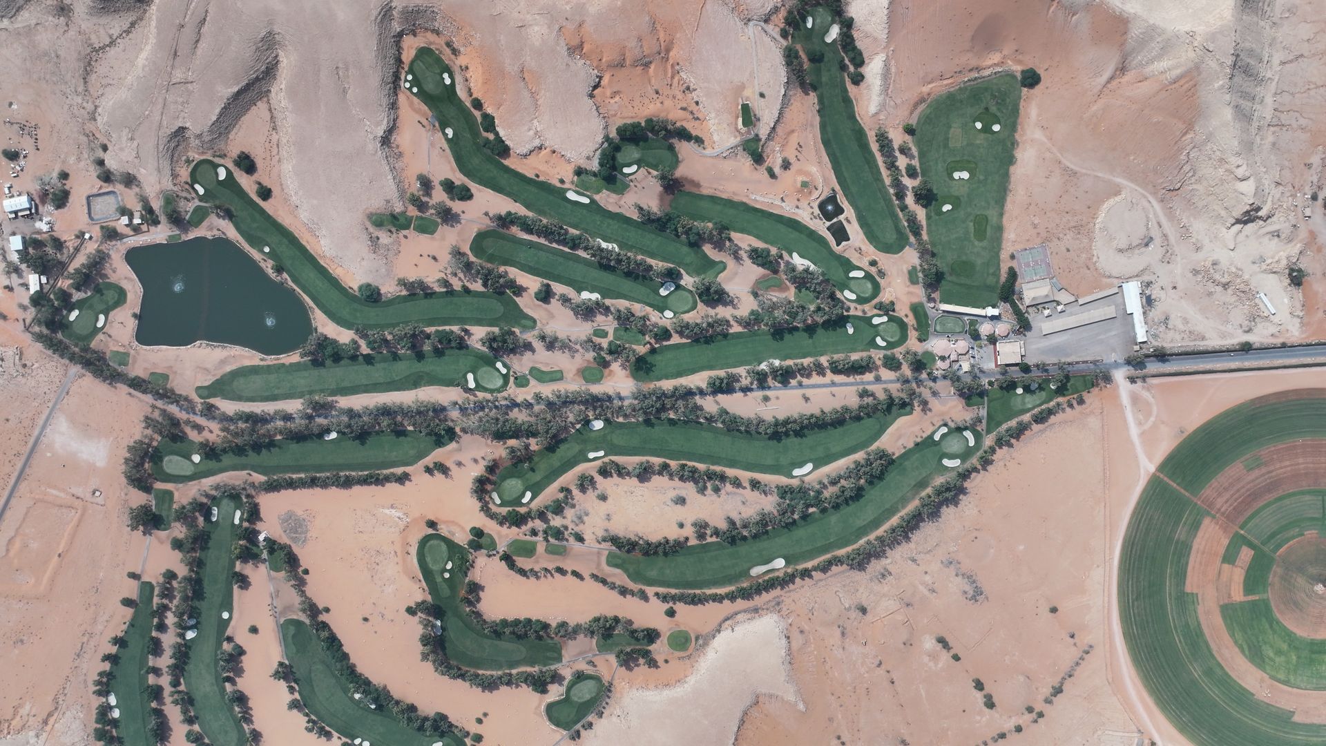 Worker inspecting road fence