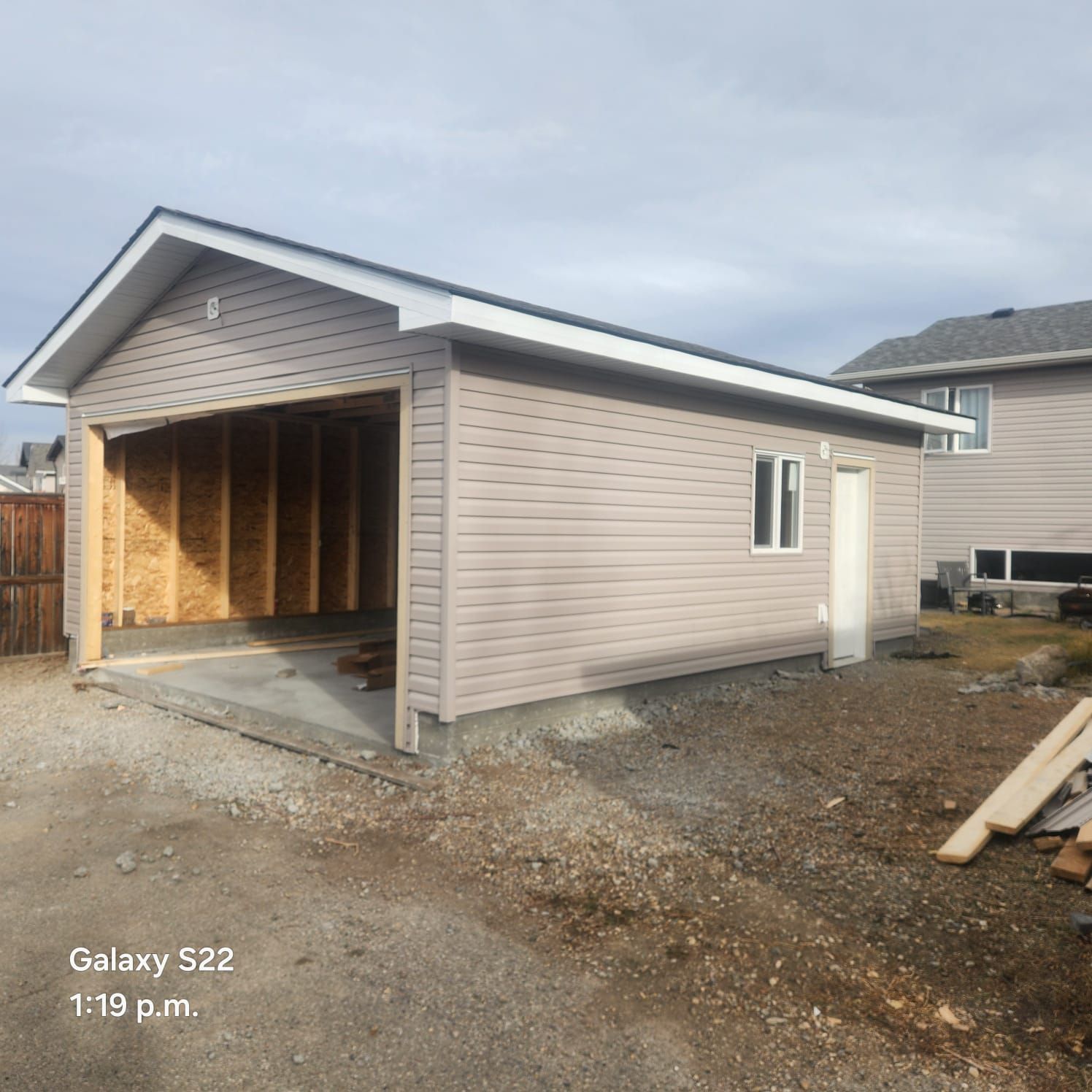 Divided view showing cluttered garage transforming into organized space with storage systems and professional team members